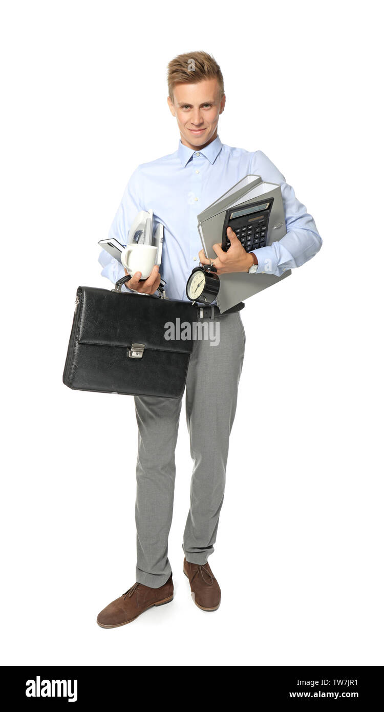 Young manager holding multiple things, isolated on white Stock Photo