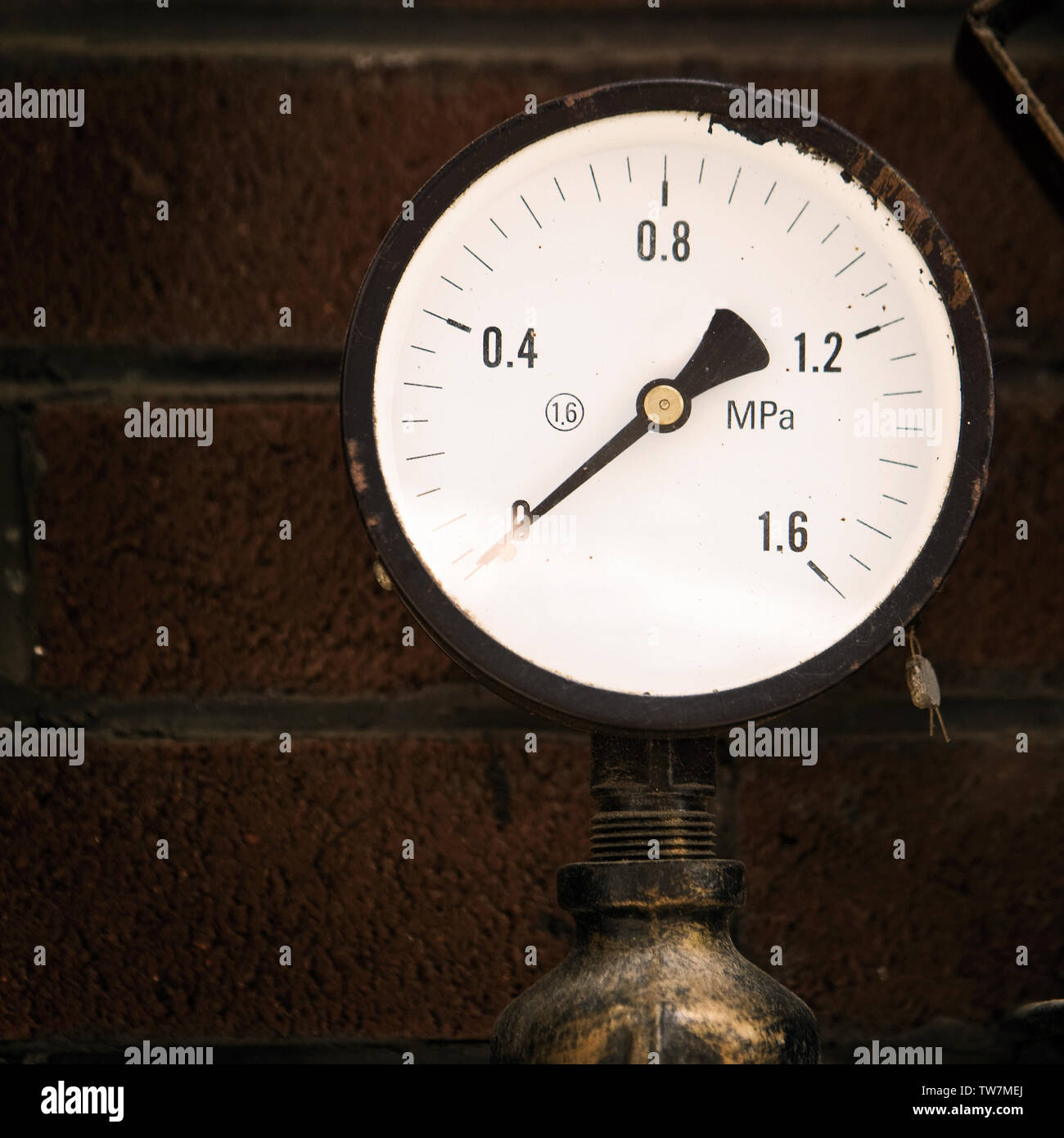 Closeup of a pressure meter on a machine Stock Photo Alamy