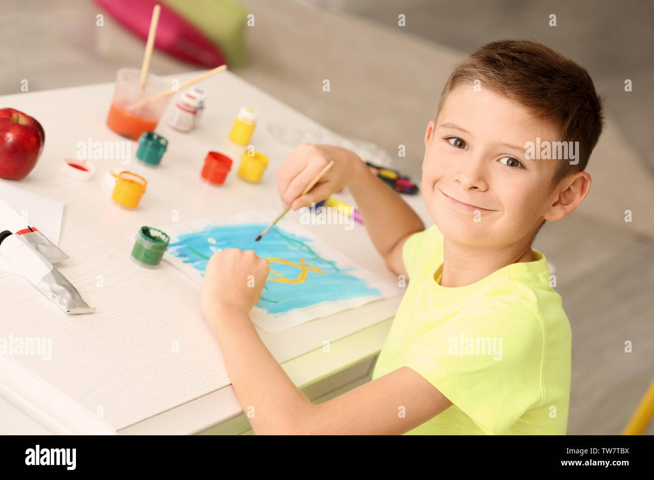Child Painting On Easel Kid Boy Stock Photo 731362156