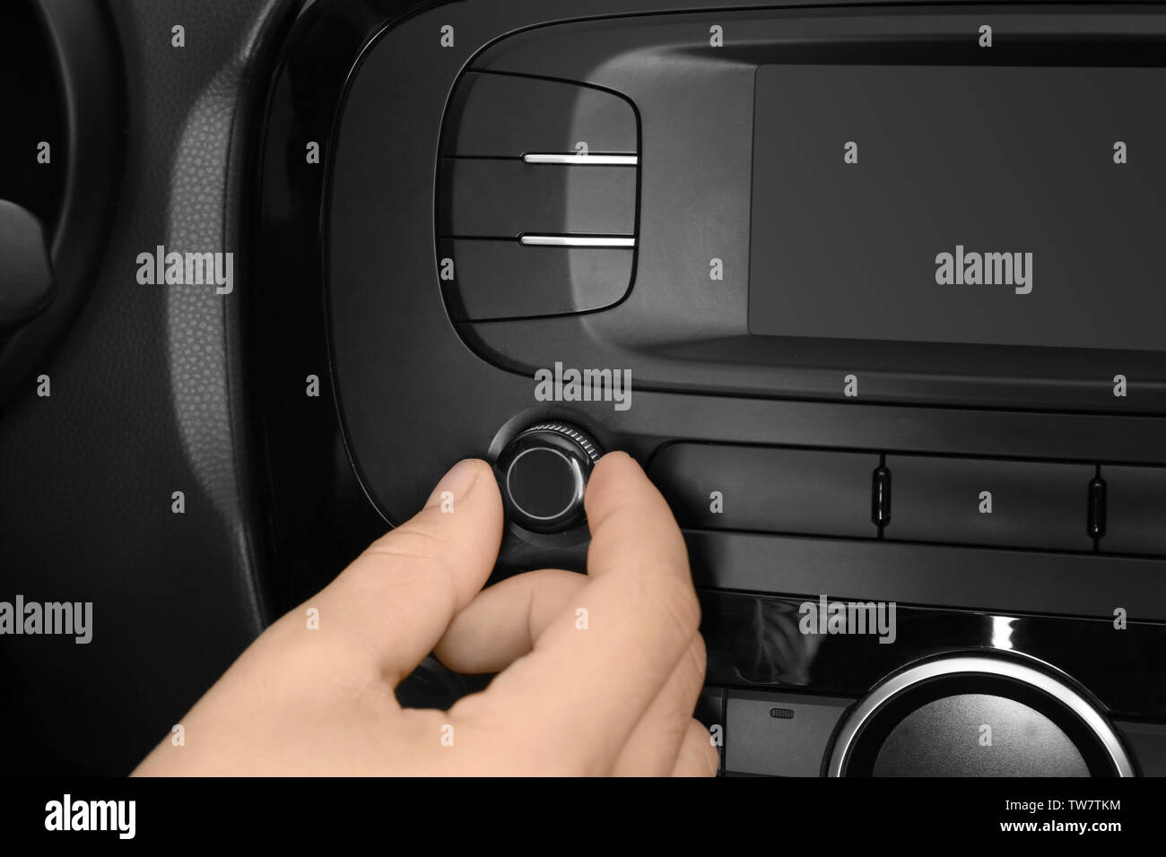 Man tuning radio in car Stock Photo Alamy