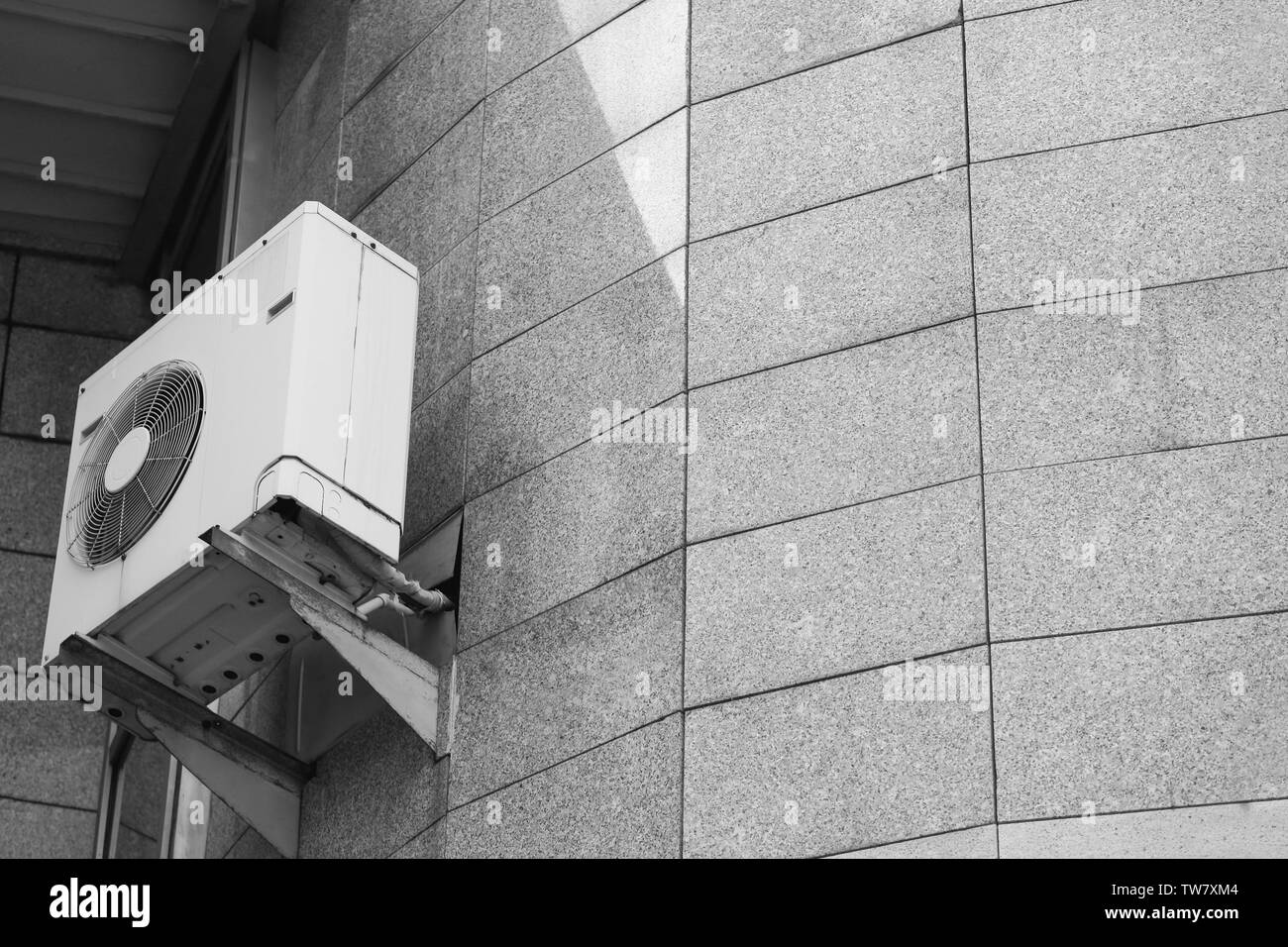 Air conditioner on wall of building, outdoors Stock Photo