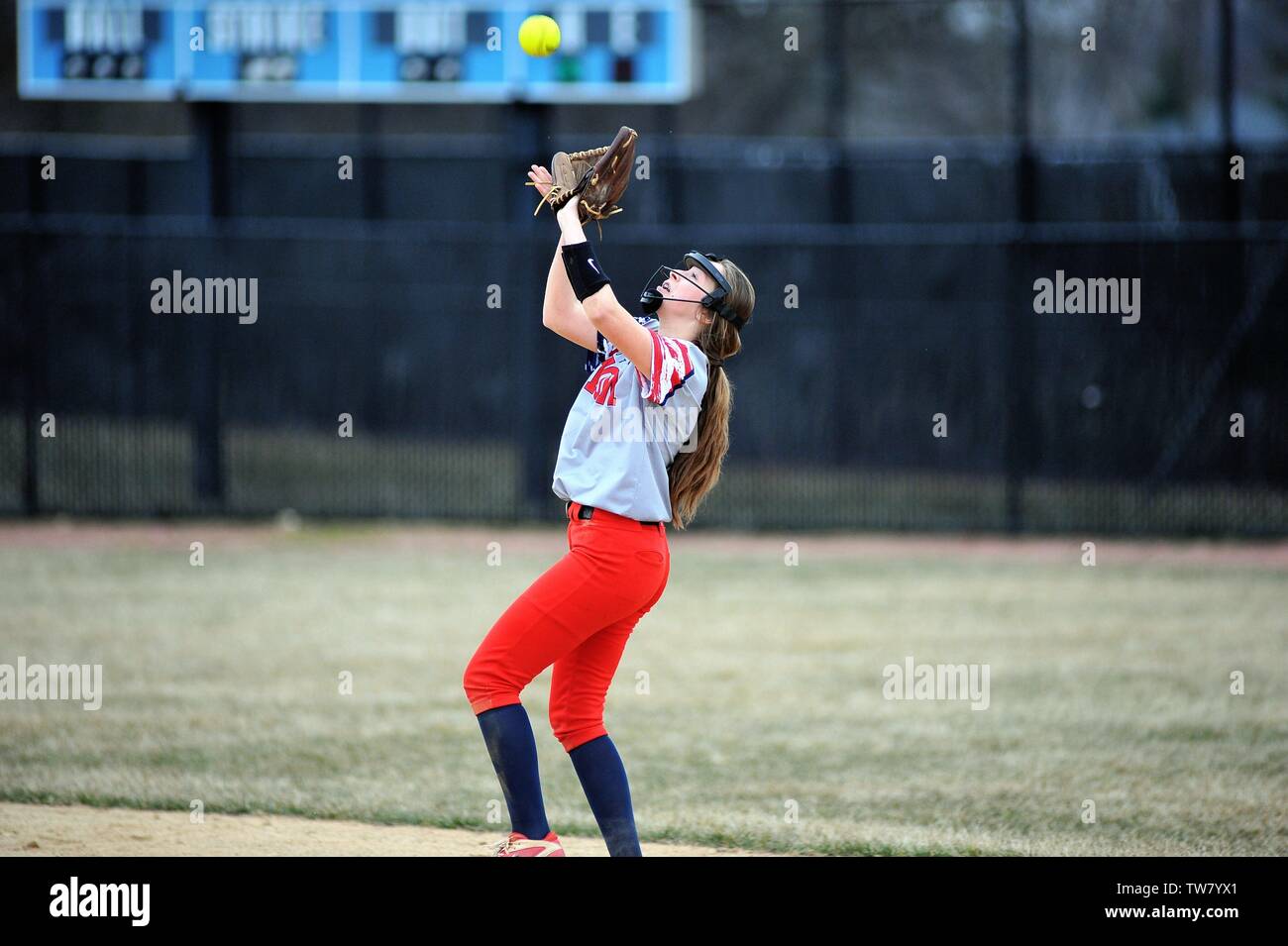 Second baseman making a catch of a pop fly. USA. Stock Photo