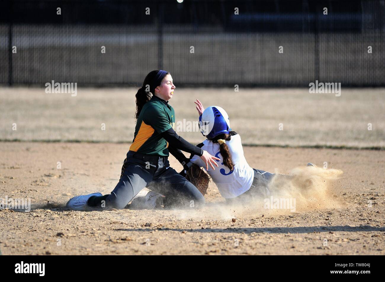 Runner being tagged out on an attempted steal of second. USA. Stock Photo