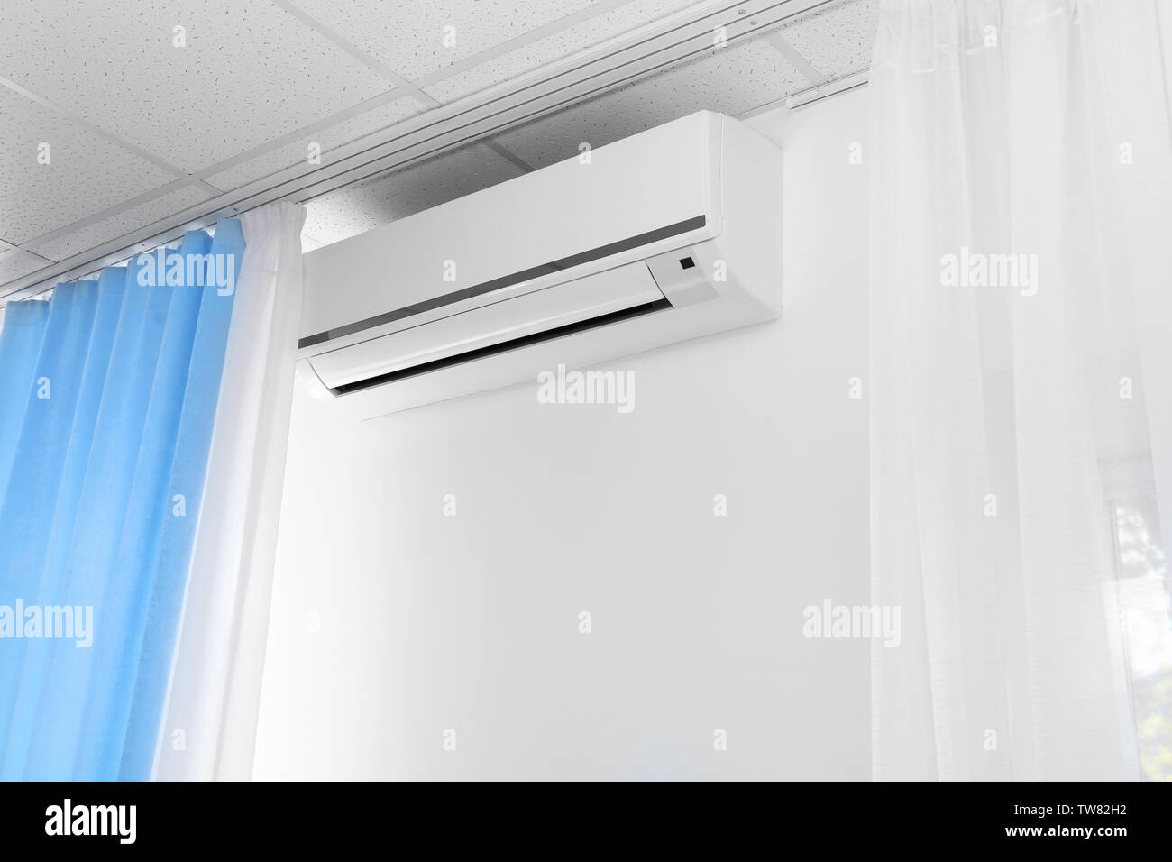 Air Conditioner On Wall In Modern Flat Stock Photo