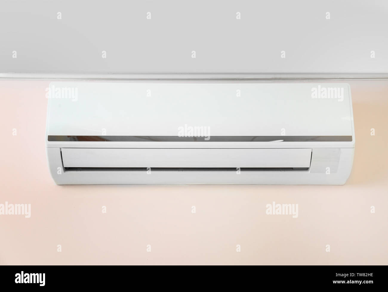 Air conditioner on wall in modern flat Stock Photo - Alamy