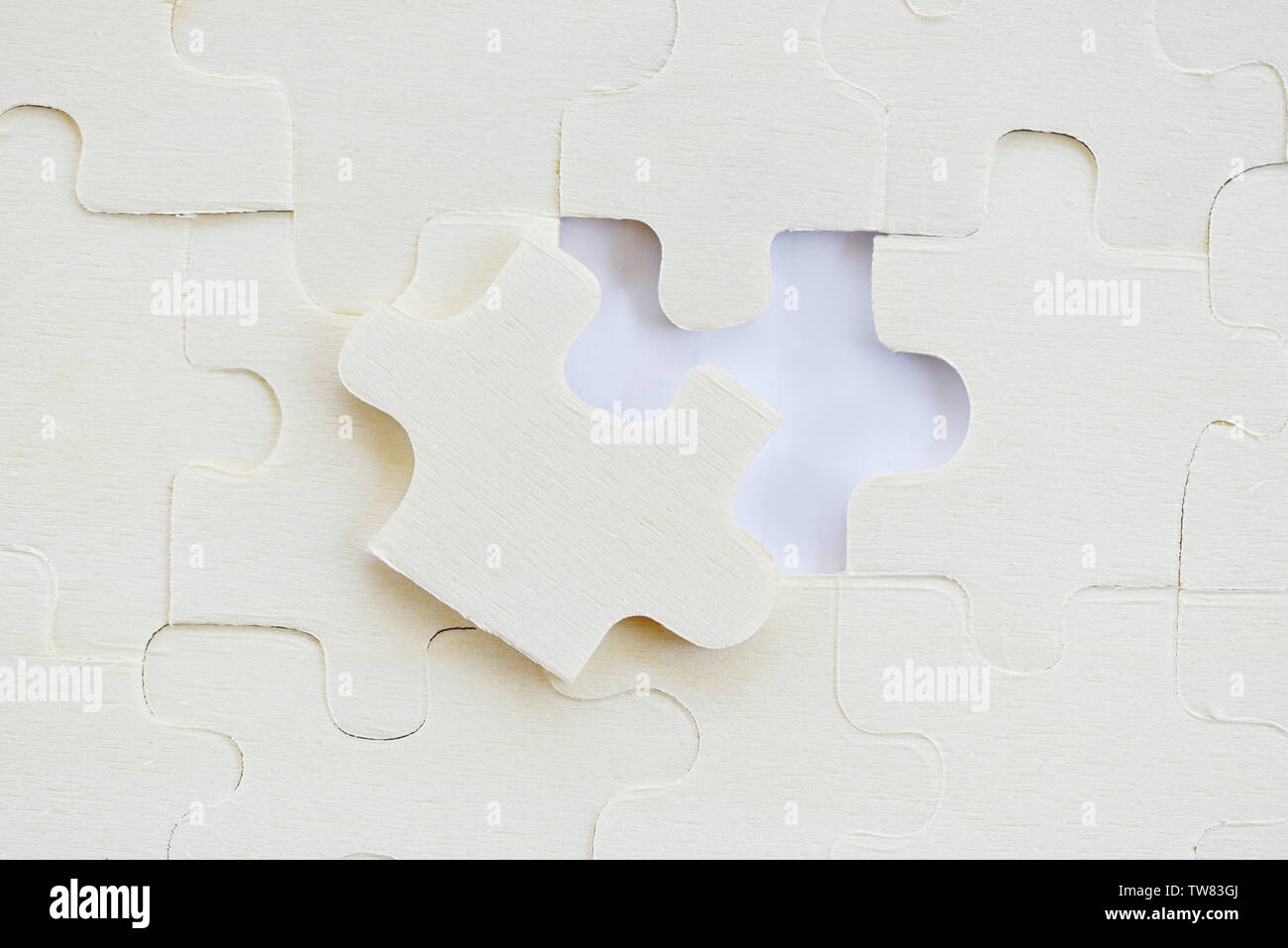 Jigsaws puzzles on white /Jigsaw pieces on texture background Stock Photo