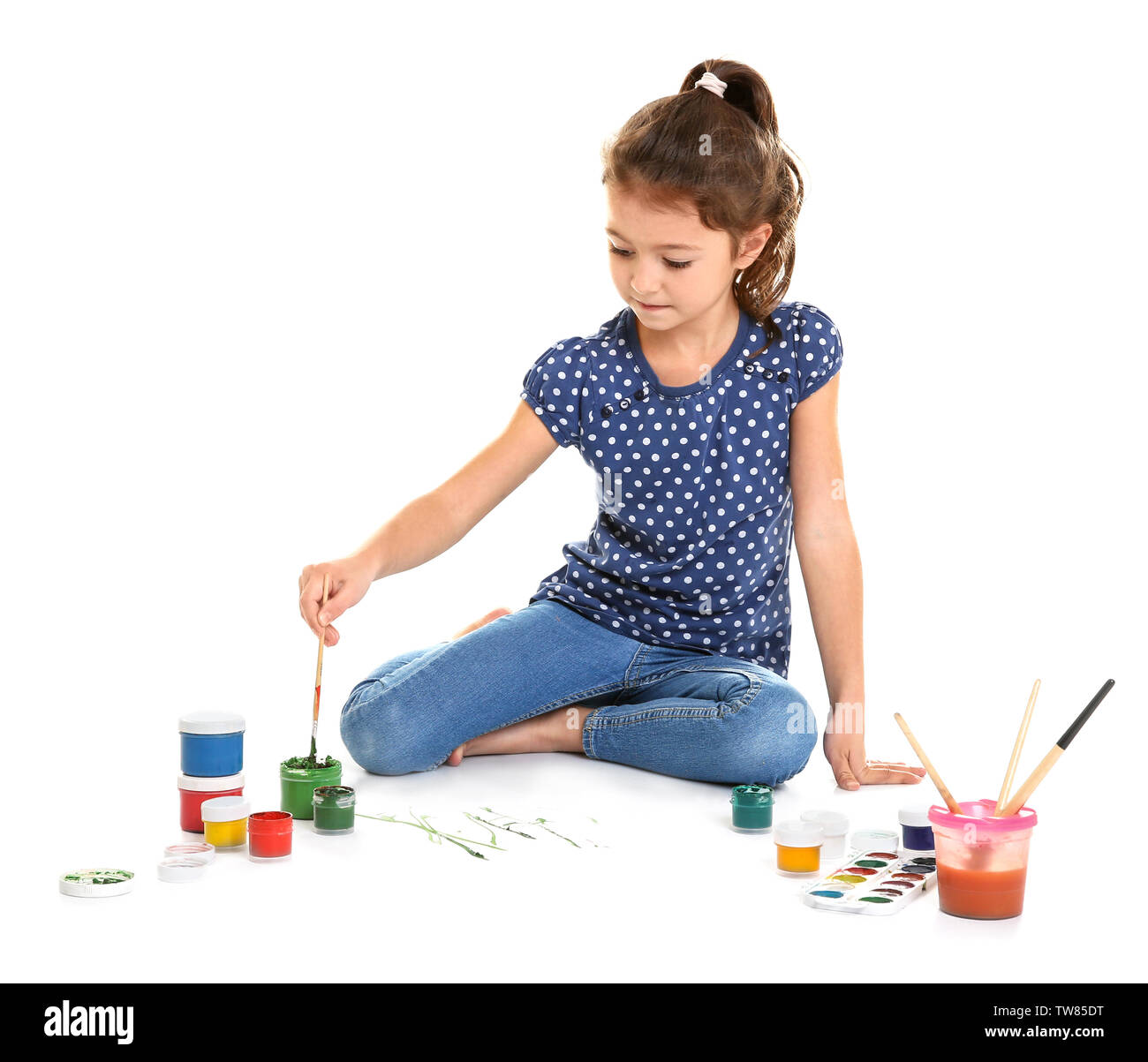 Little Girl Painting On Big Sheet Of Paper Isolated On White Stock Little girl painting on big sheet of paper isolated on white stock