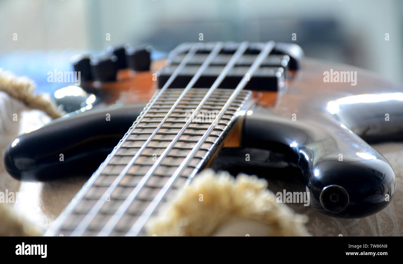 4 Strings vitange Electric Bass Guitar With Hands playing and different perspective Stock Photo