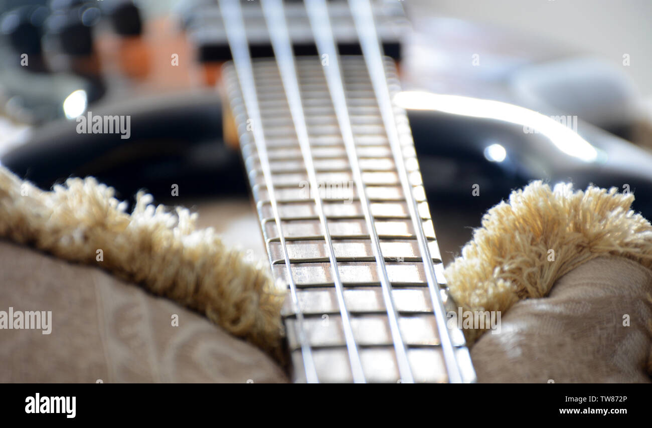 4 Strings vitange Electric Bass Guitar With Hands playing and different perspective Stock Photo