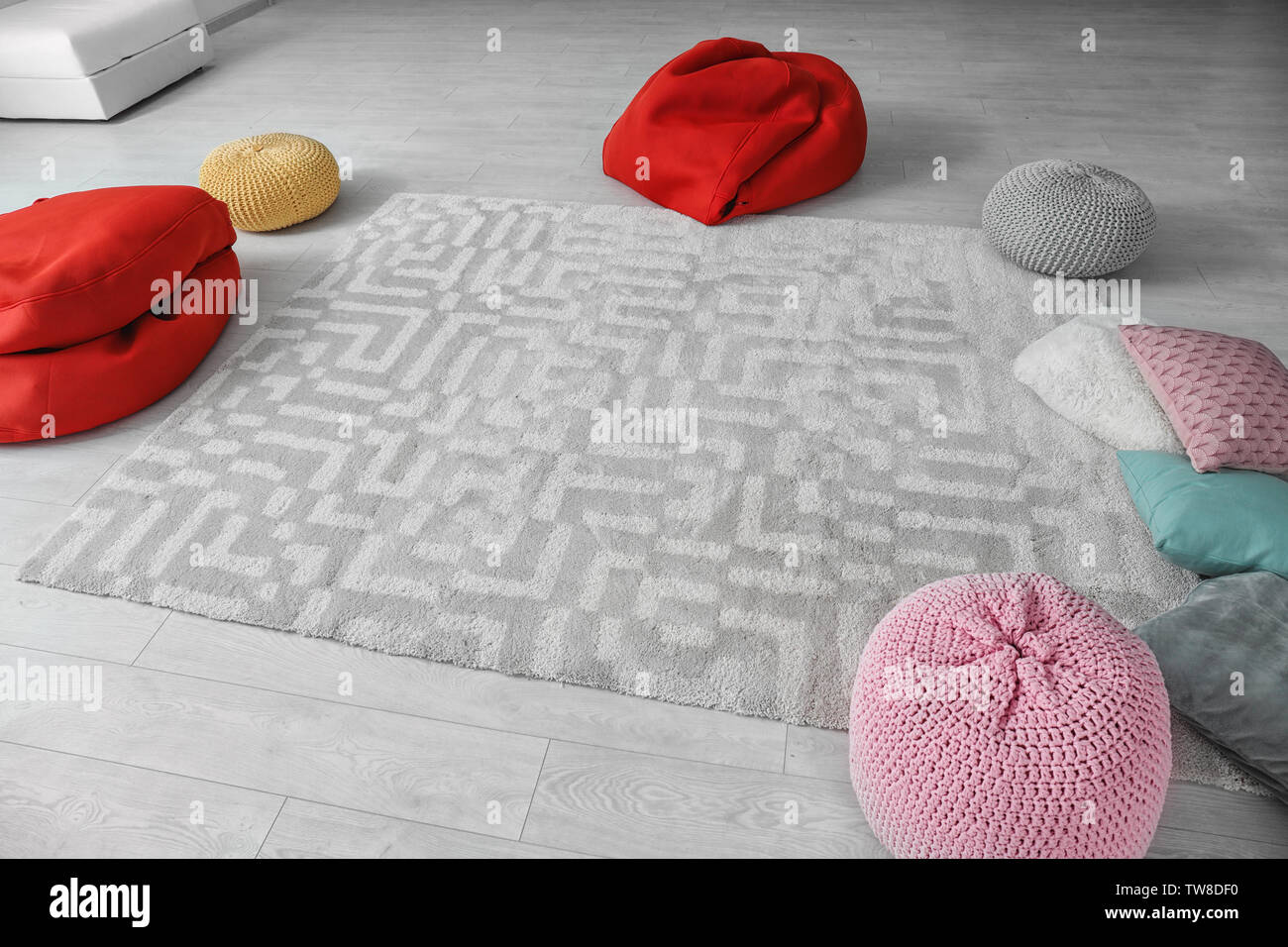 Poufs in room prepared for group psychotherapy session Stock Photo
