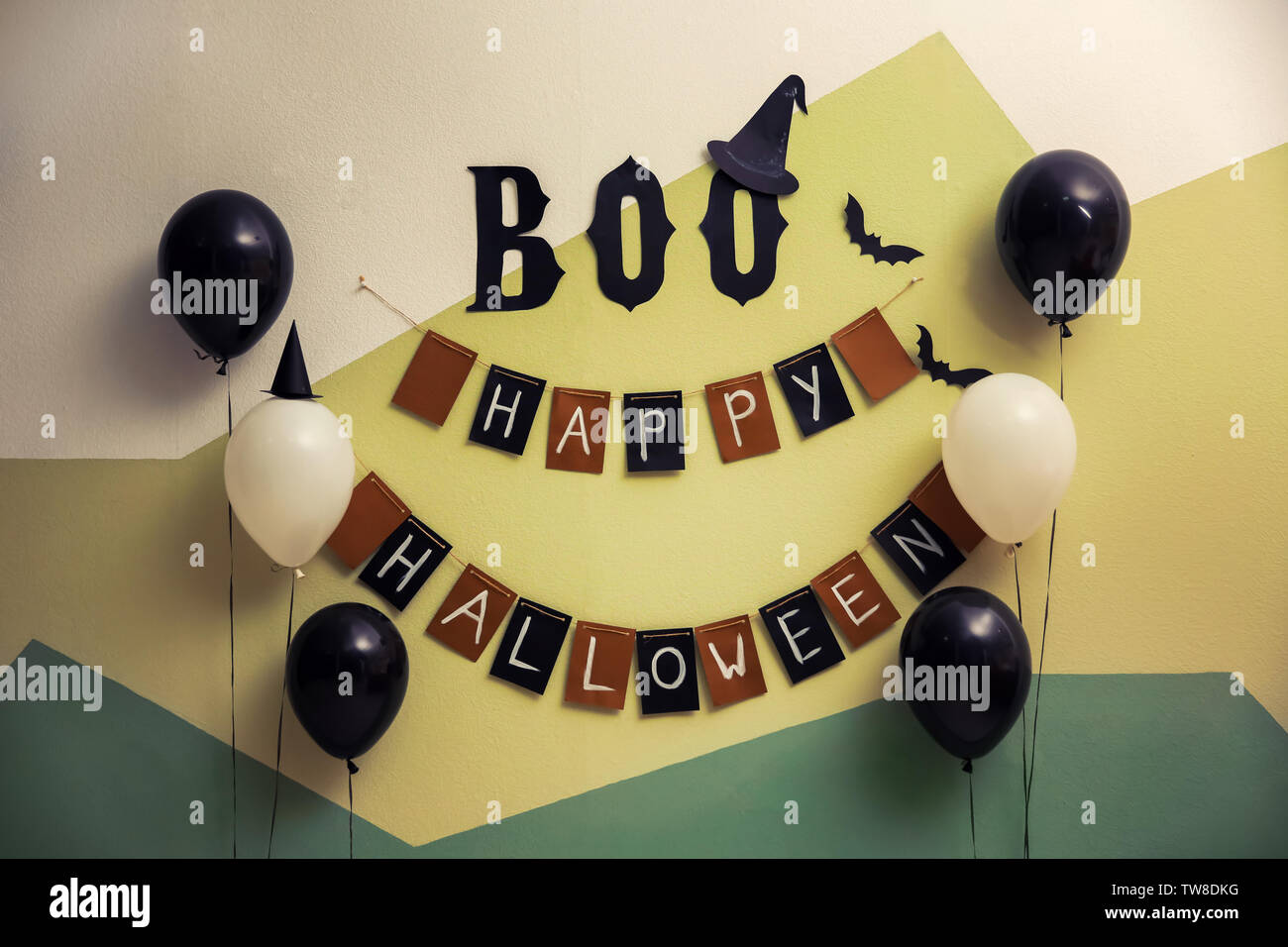 Creative decor for Halloween party on color wall Stock Photo Alamy