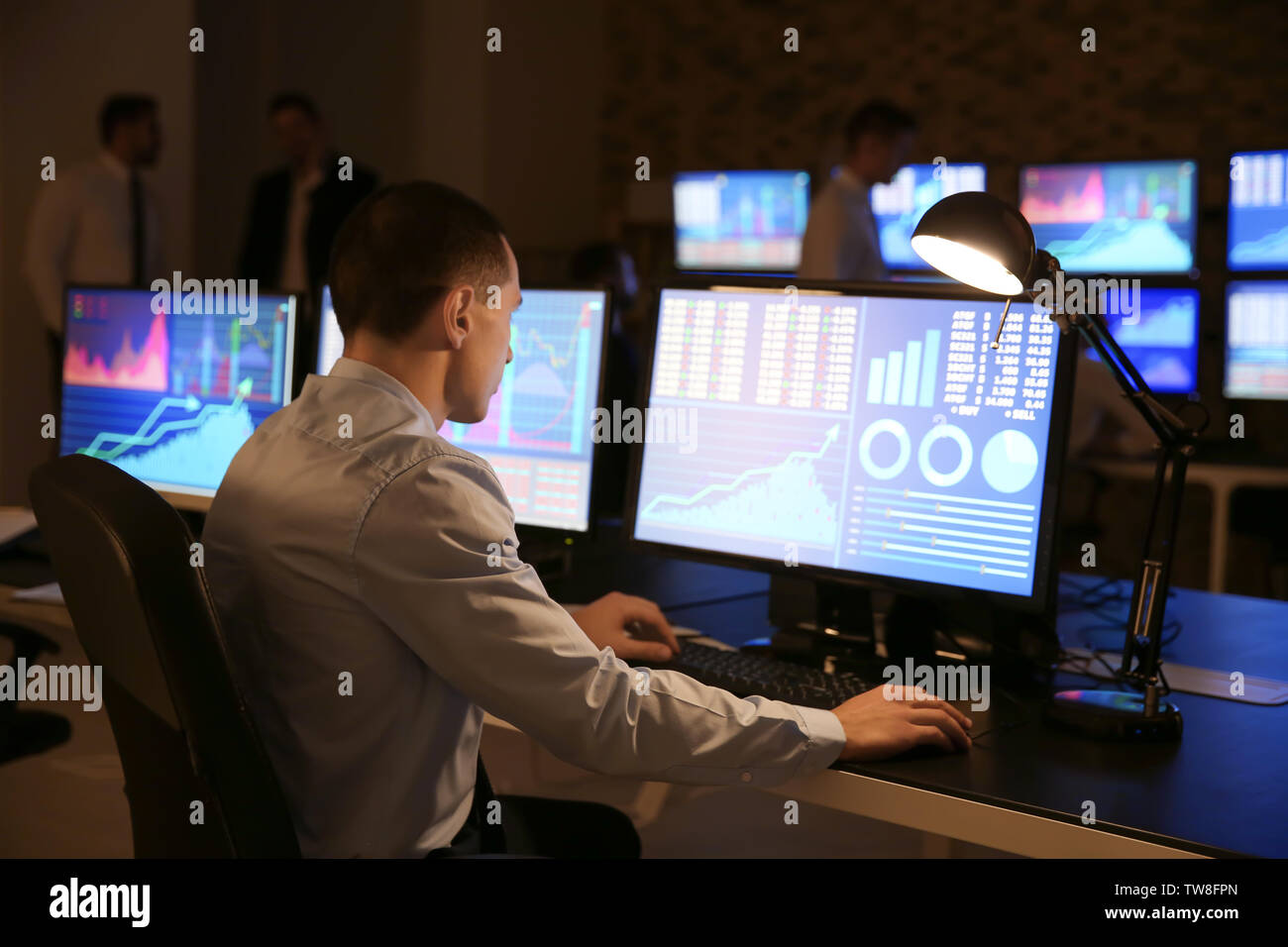 Male Stock Trader Working In Office Stock Photo 256499565 Alamy