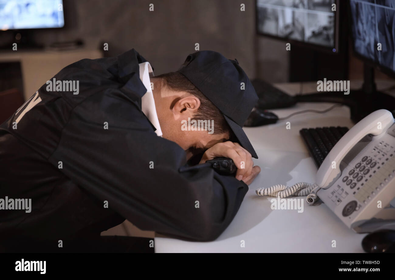 Sleeping security guard hires stock photography and images Alamy