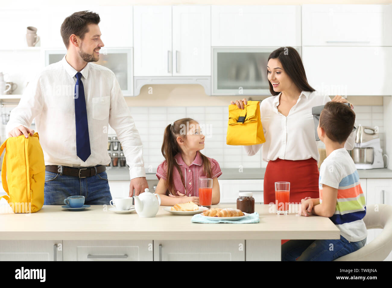 Young Mother Helping Her Children Get Ready For School Stock Photo Alamy Young Mother Helping Her Children Get Ready For School Stock Photo Alamy