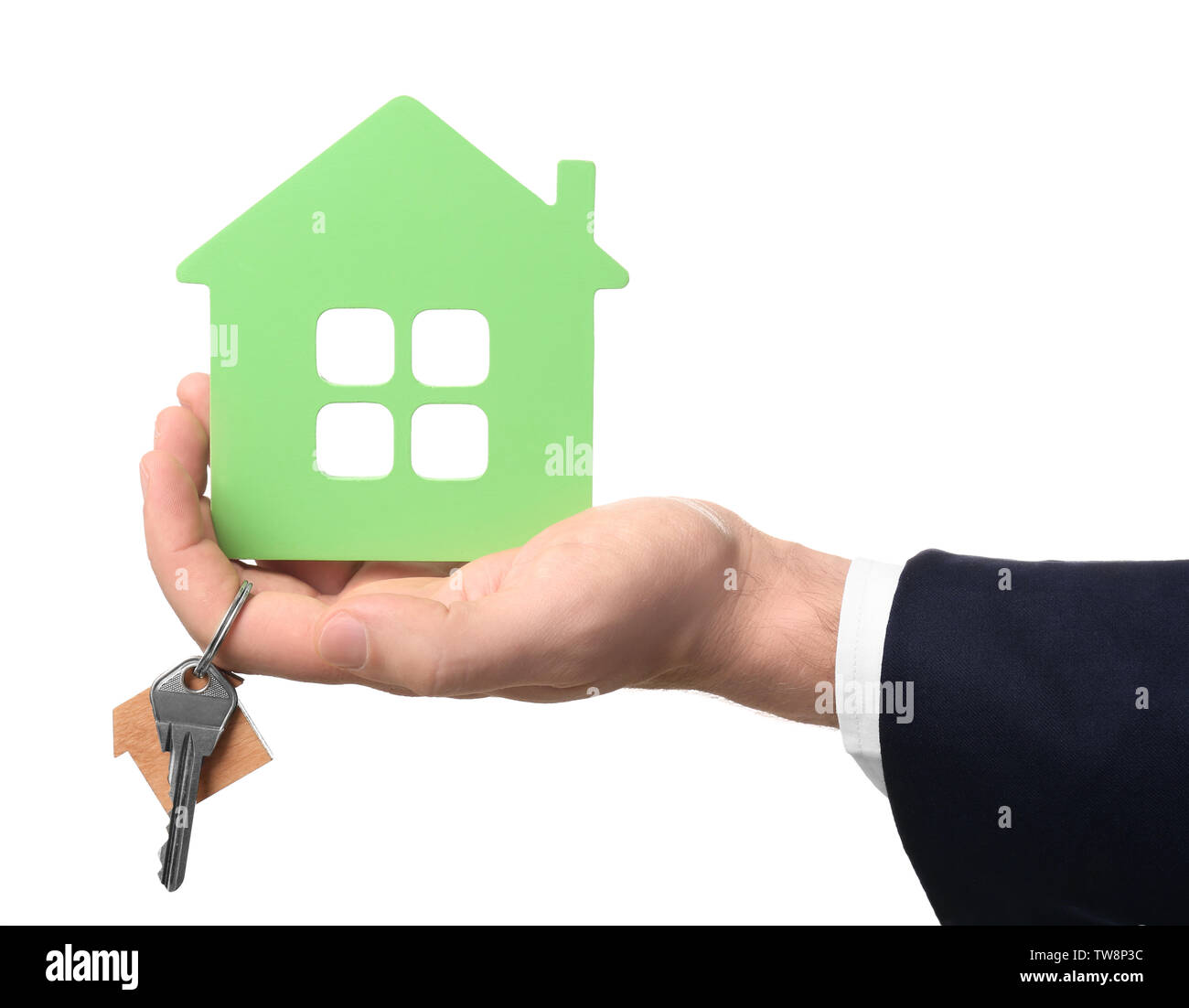 Real estate agent holding house model and key on white background Stock ...