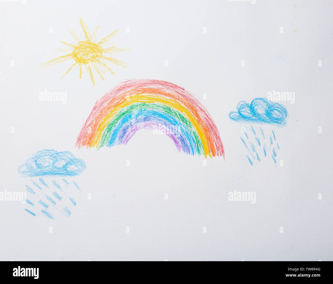Childish drawing of sky with rainbow Stock Photo - Alamy