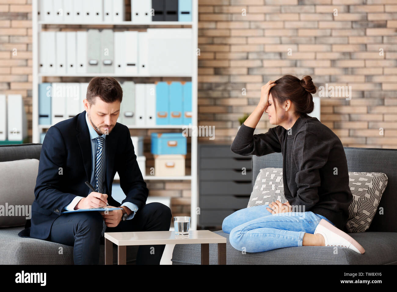 Male psychologist with patient in office Stock Photo Alamy