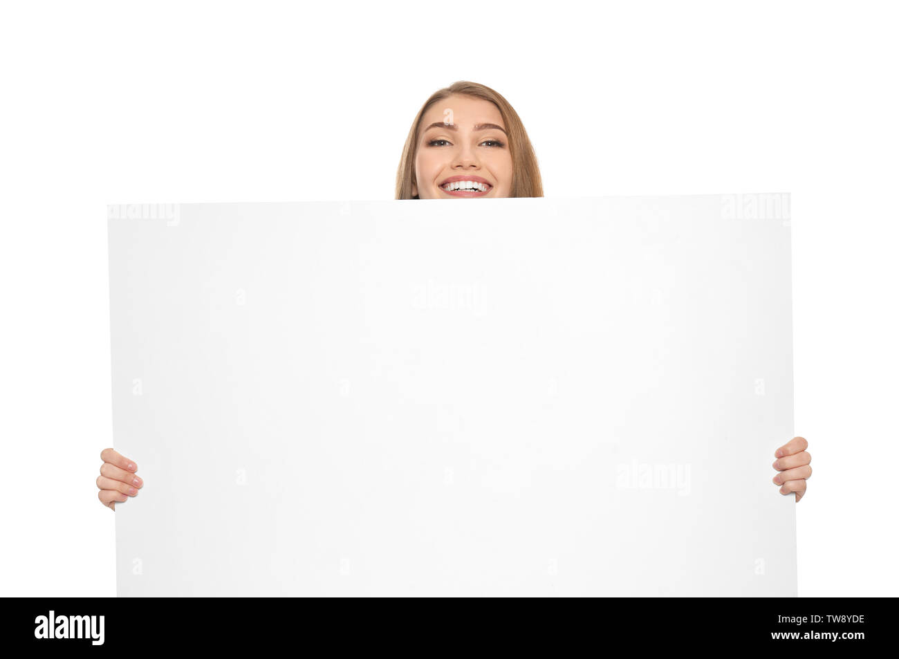 Young woman with blank advertising board on white background Stock Photo