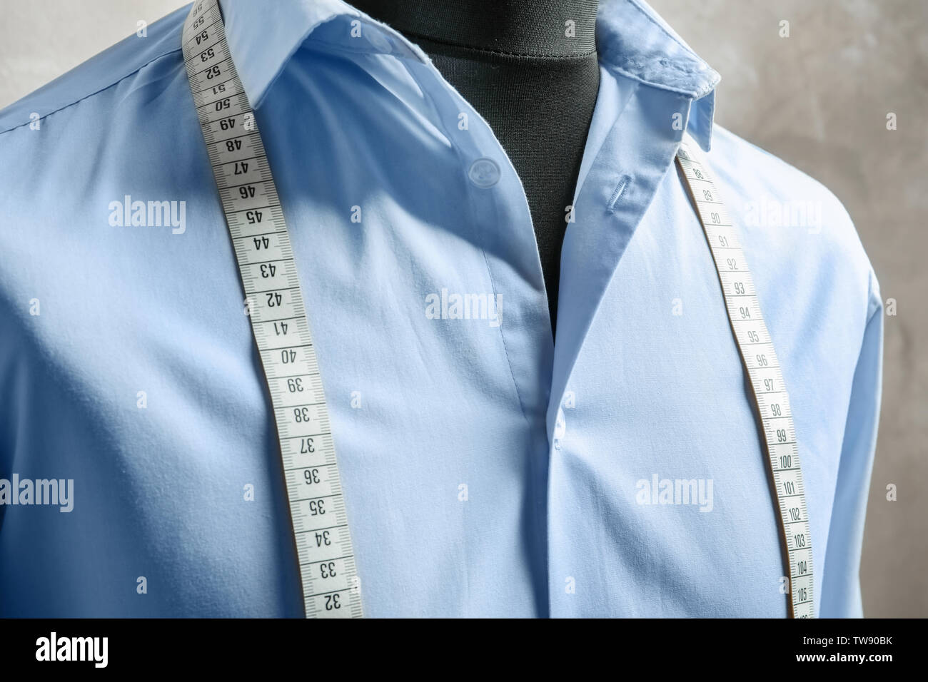 Semiready Jacket With Tailors Measuring Tape On Mannequin Against