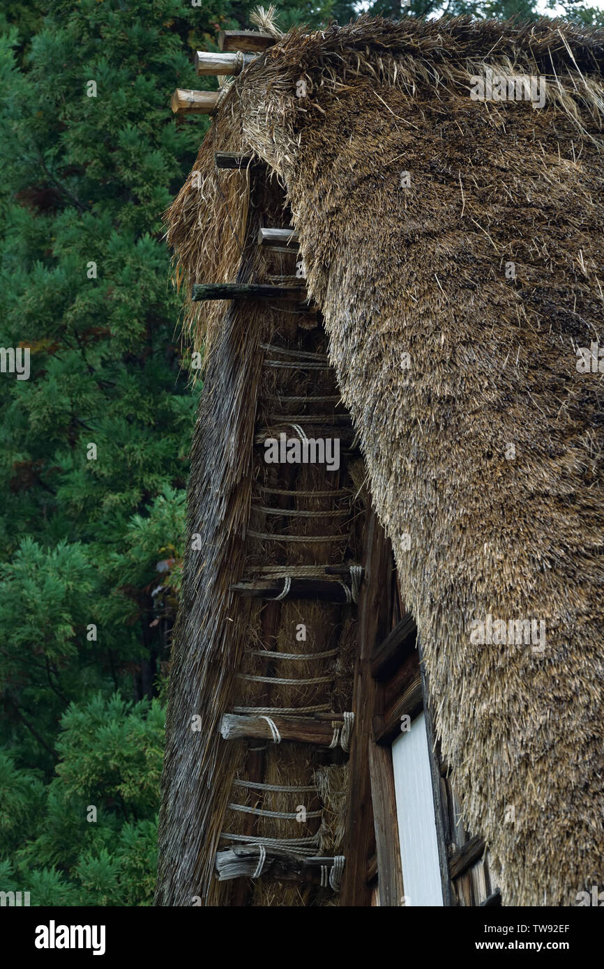 Historic Japanese Gassho style rural house thatched roof architectural details. Ainokura village, Toyama prefecture, Japan. Gasshō-zukuri 合掌造 Minka 民家 Stock Photo