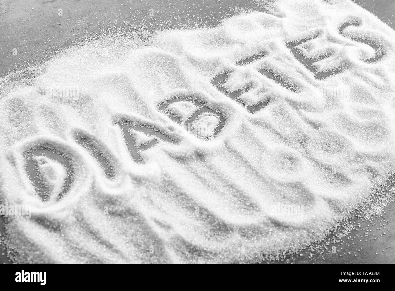 Word 'Diabetes' written on sugar Stock Photo