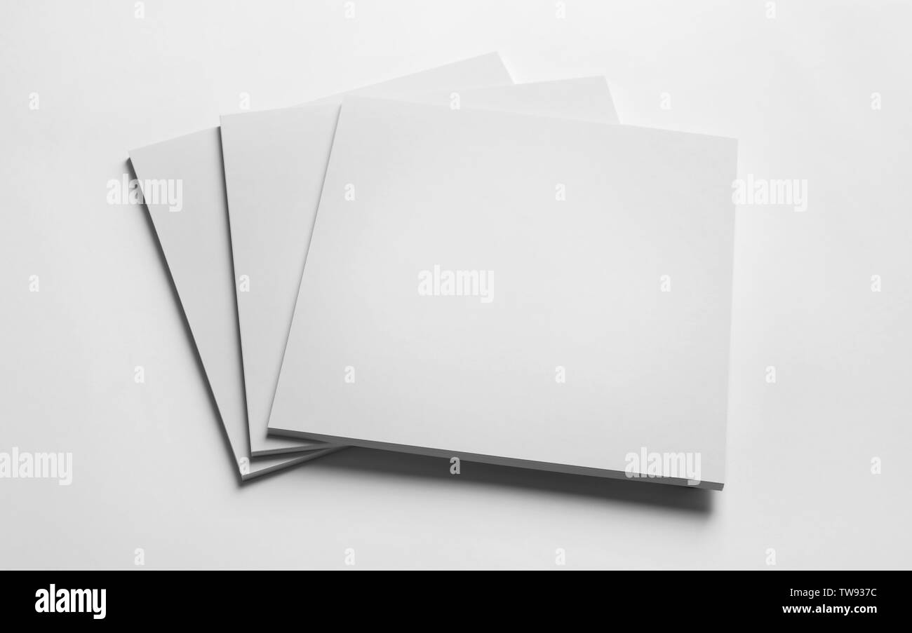 Blank sheets of paper on white background. Mock up for design Stock