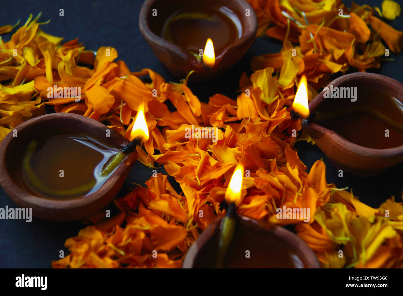 Close up of burning oil lamps Stock Photo Alamy
