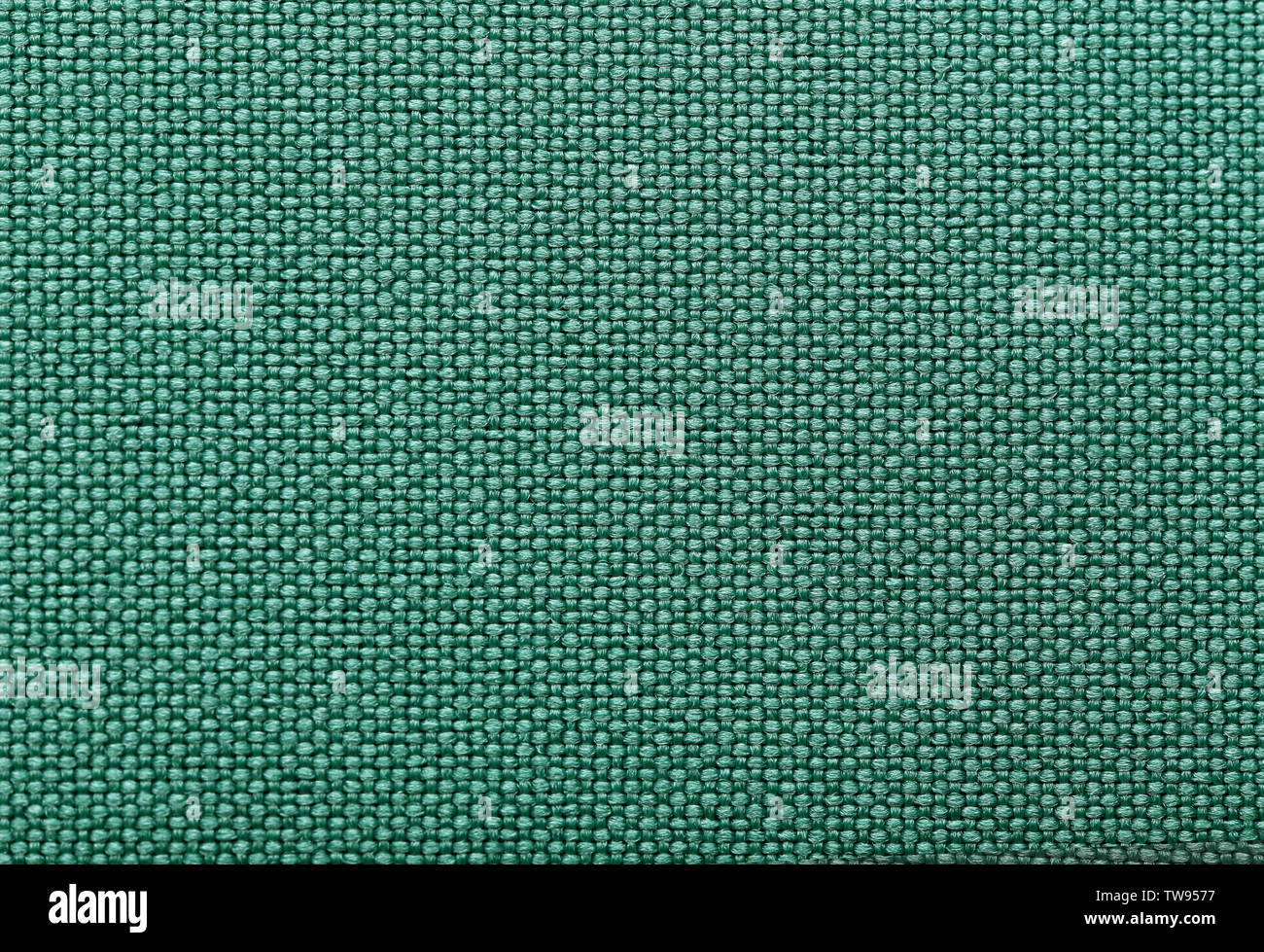 Green cotton fabric texture as background, closeup Stock Photo - Alamy