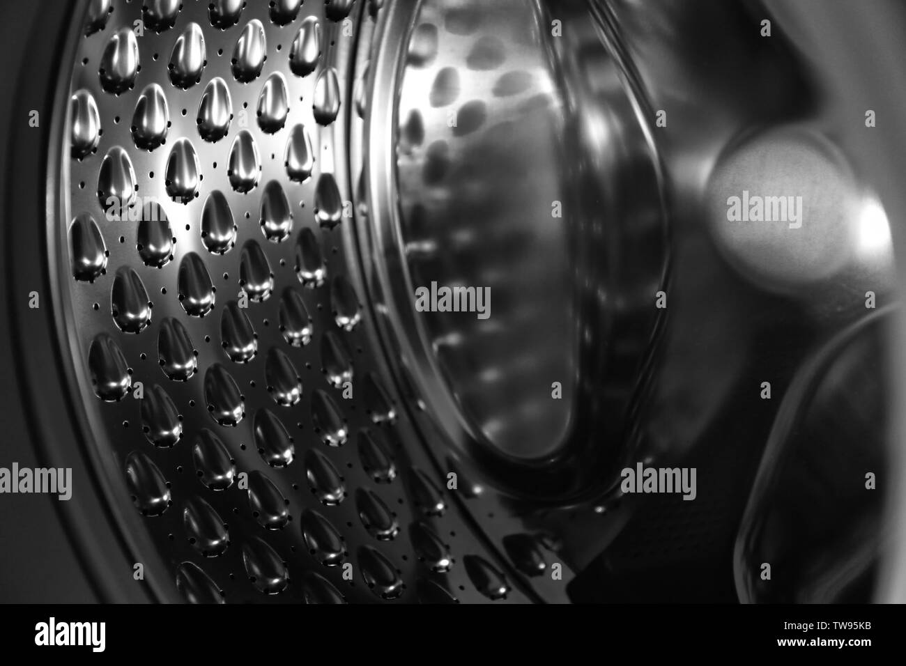 Laundry machine drum, closeup Stock Photo Alamy