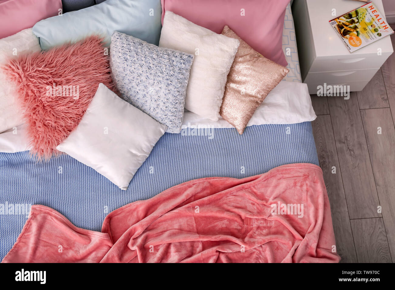 Comfortable bed with soft pillows, top view Stock Photo Alamy