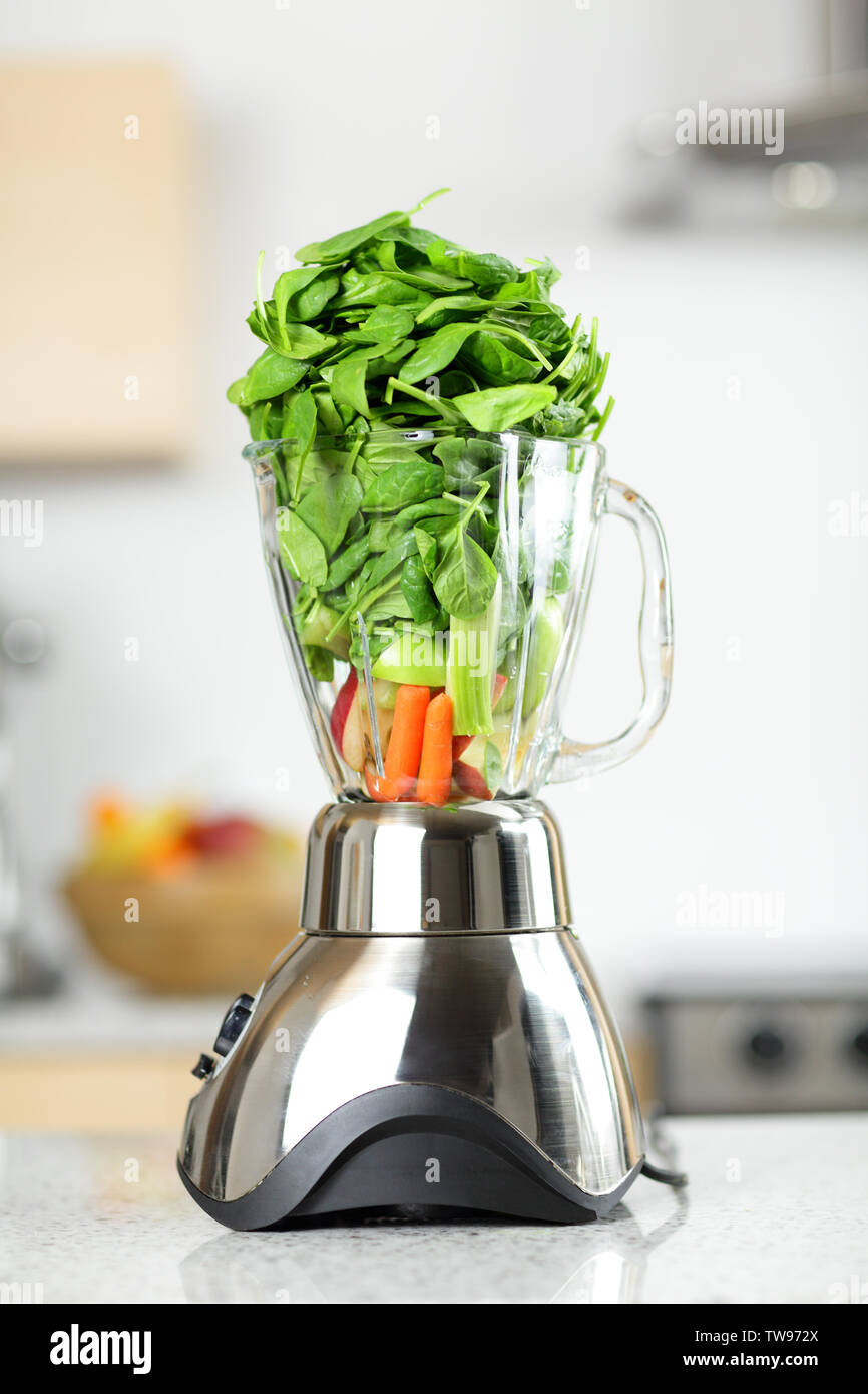 https://c8.alamy.com/comp/TW972X/green-vegetable-smoothie-in-blender-healthy-food-concept-with-spinach-celery-carrot-etc-vegetables-smoothies-ready-in-blender-in-kitchen-at-home-TW972X.jpg