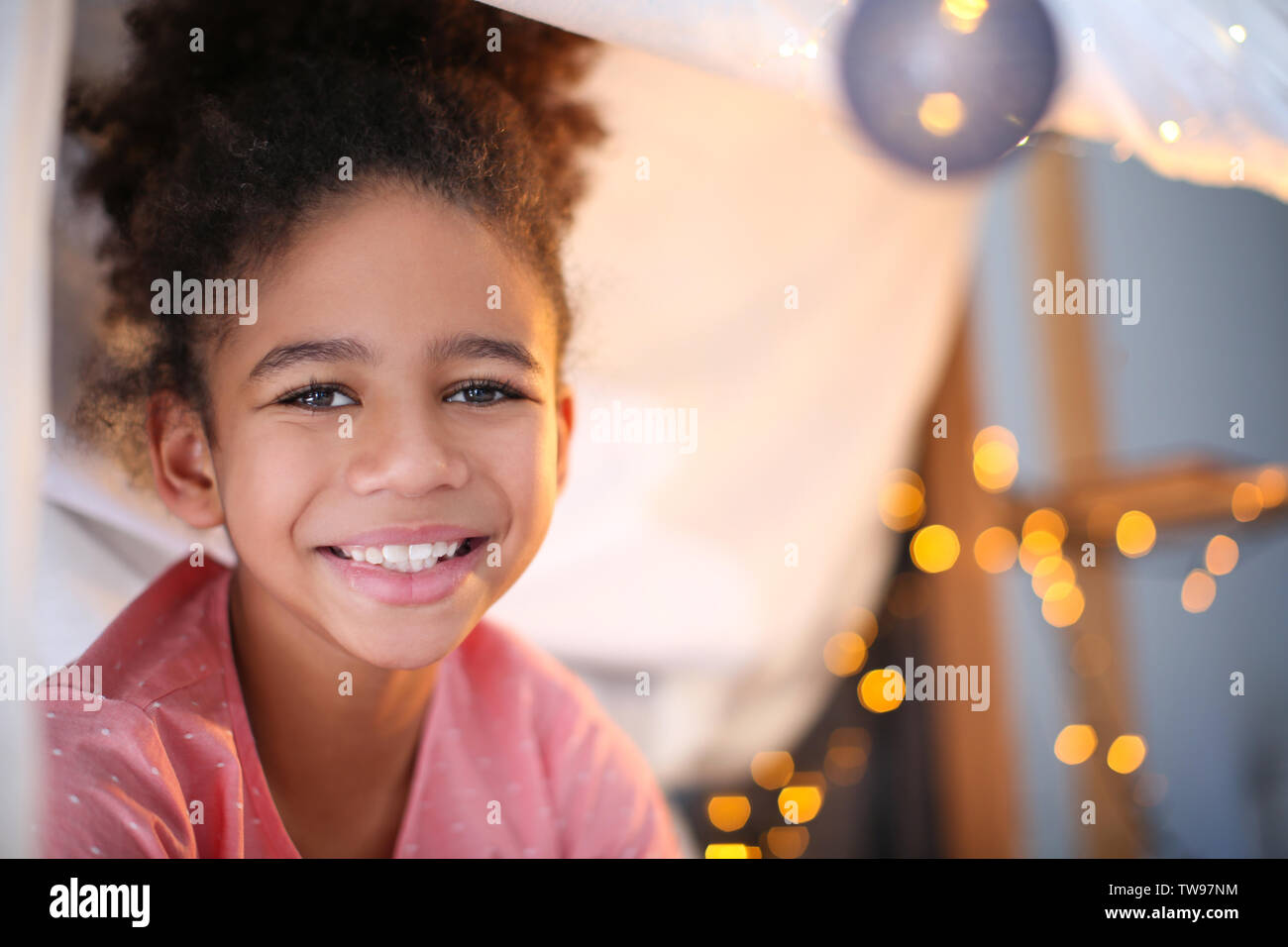 Cute African American girl at home Stock Photo - Alamy