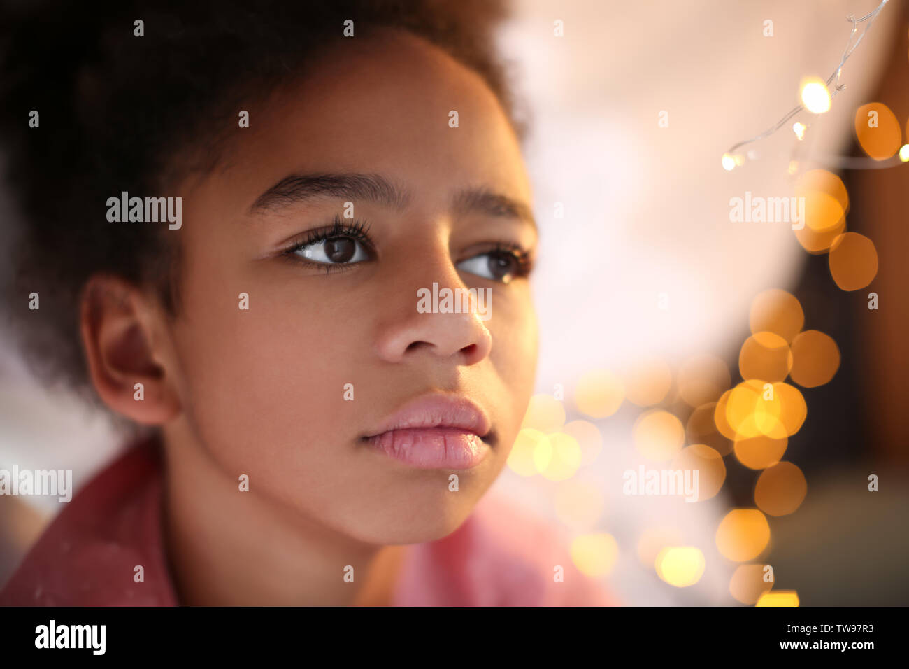 Cute African American girl at home Stock Photo - Alamy