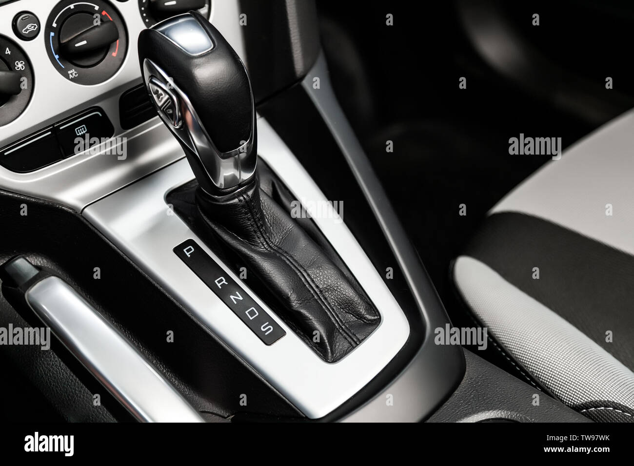 Close up of the accelerator handle with silver metallic. automatic