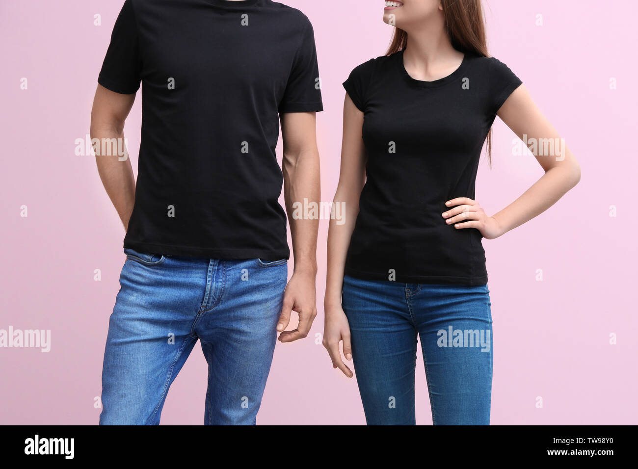Download Young Woman And Man In Black T Shirts On Color Background Mockup For Design Stock Photo Alamy PSD Mockup Templates