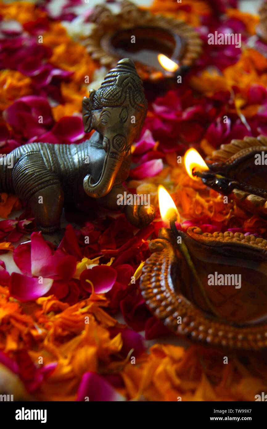 Statue of Lord Ganesha with diwali diyas Stock Photo Alamy