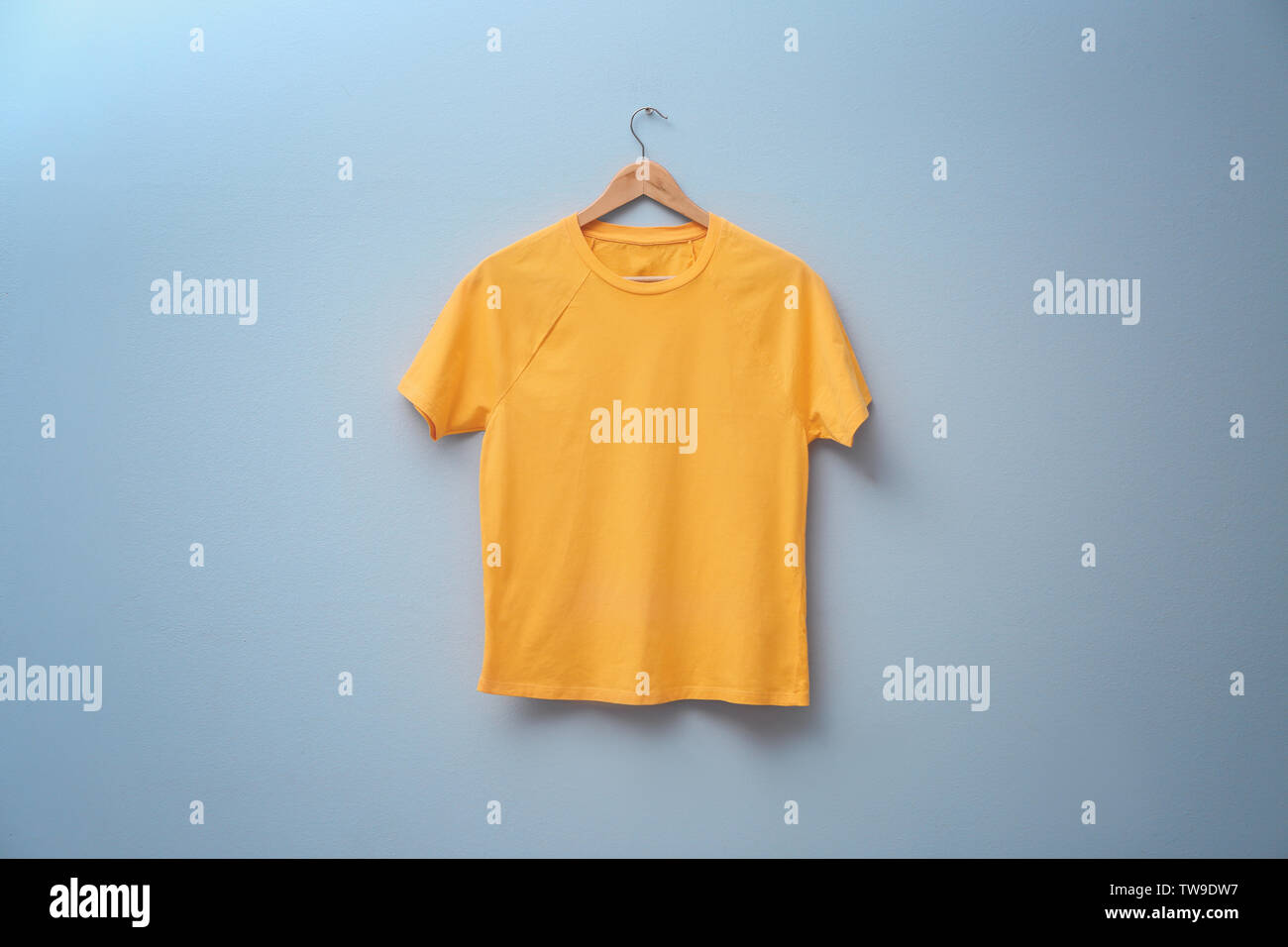 Download Yellow T Shirt On Color Background Mock Up For Design Stock Photo Alamy PSD Mockup Templates