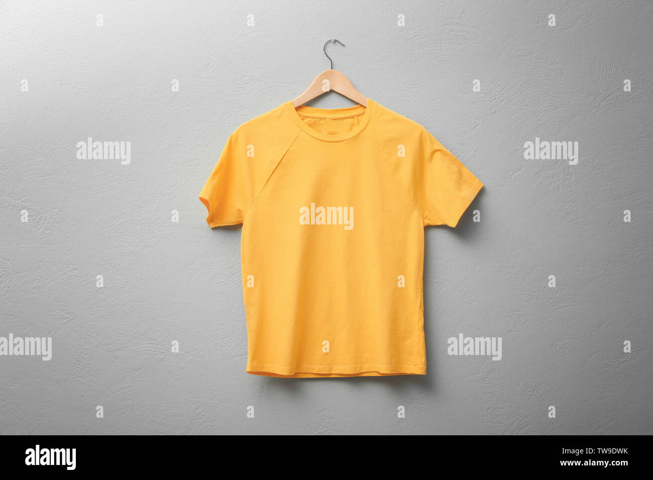 Download Yellow T Shirt On Light Background Mock Up For Design Stock Photo Alamy PSD Mockup Templates