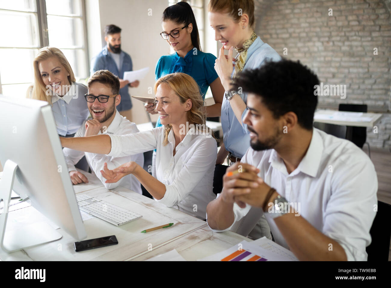 Successful business group of people at work in office Stock Photo - Alamy