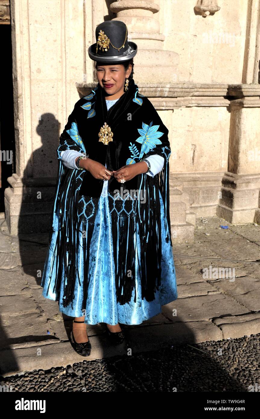 PERU,A WOMAN DRESSED IN TRADITIONAL CLOTHING DURING A RELIGIOUS ...