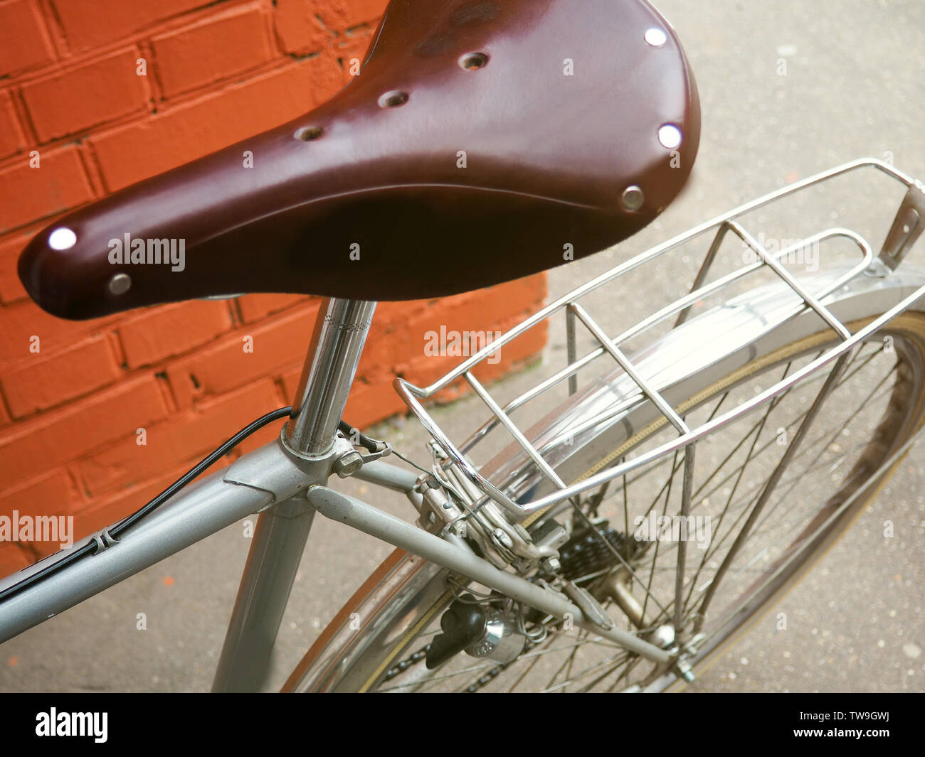 Brown leather saddle of bicycle from top view Stock Photo Alamy