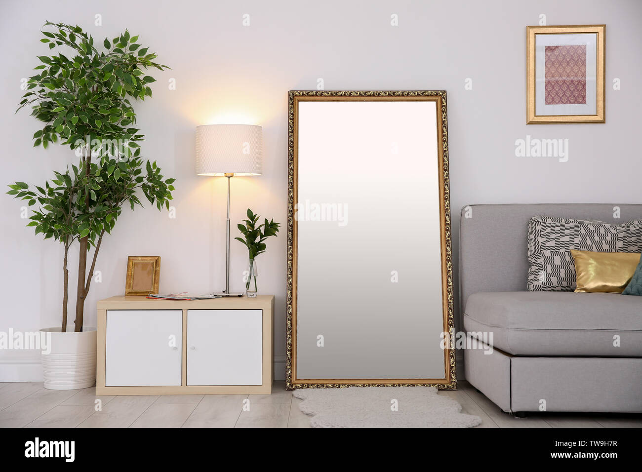 Elegant Room Interior With Large Mirror Stock Photo
