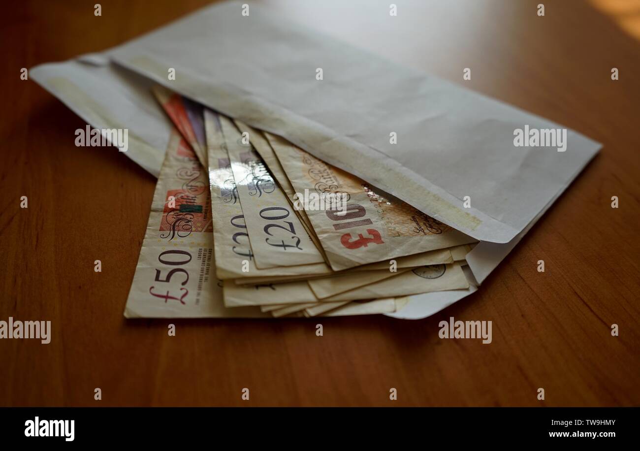 Envelope money scotland hi-res stock photography and images - Alamy