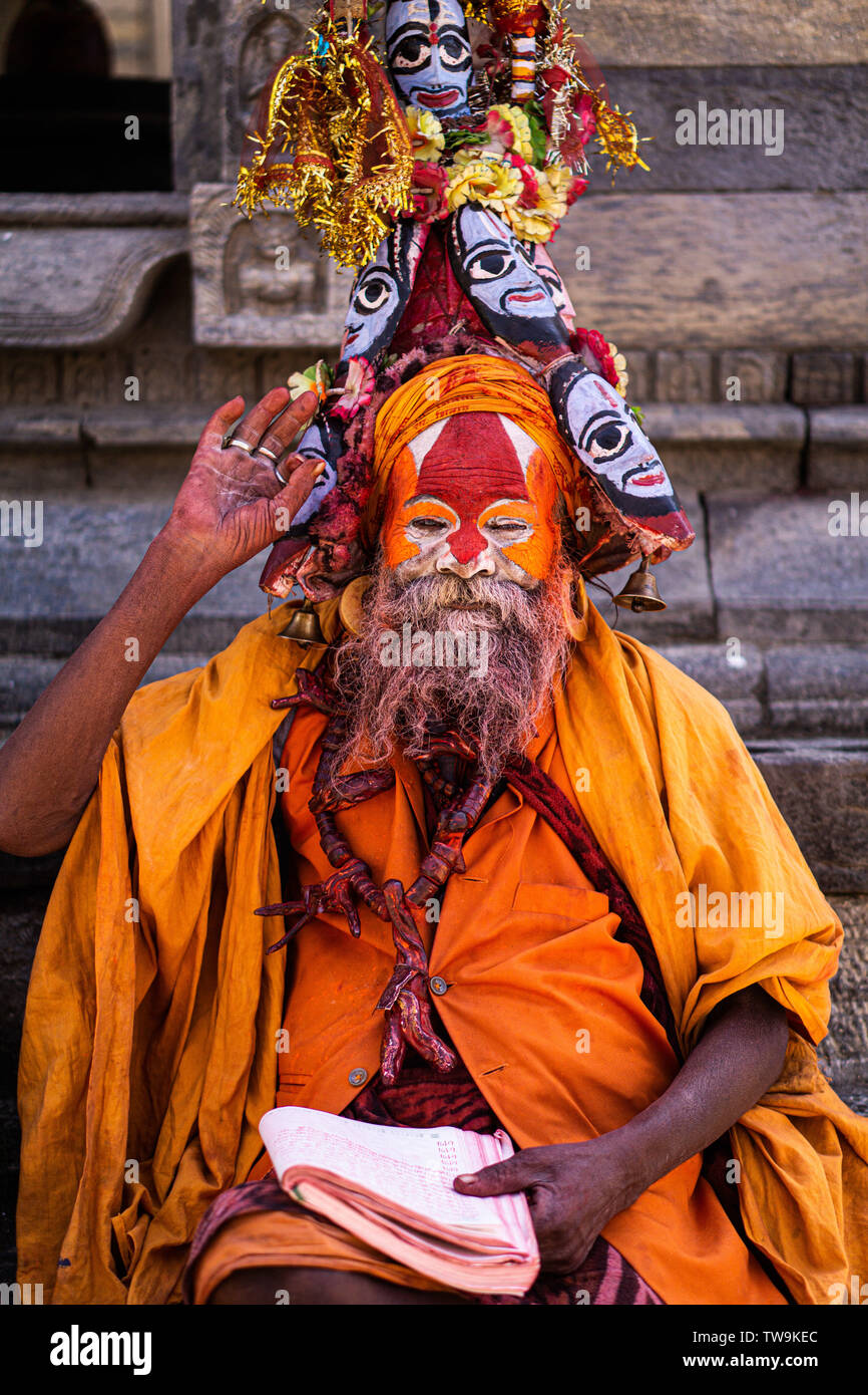 Sadhu or holy man at Pashupatinath temple complex in Kathmandu, Nepal.  Sadhus renounce worldly life to follow path of spiritual discipline Stock Photo