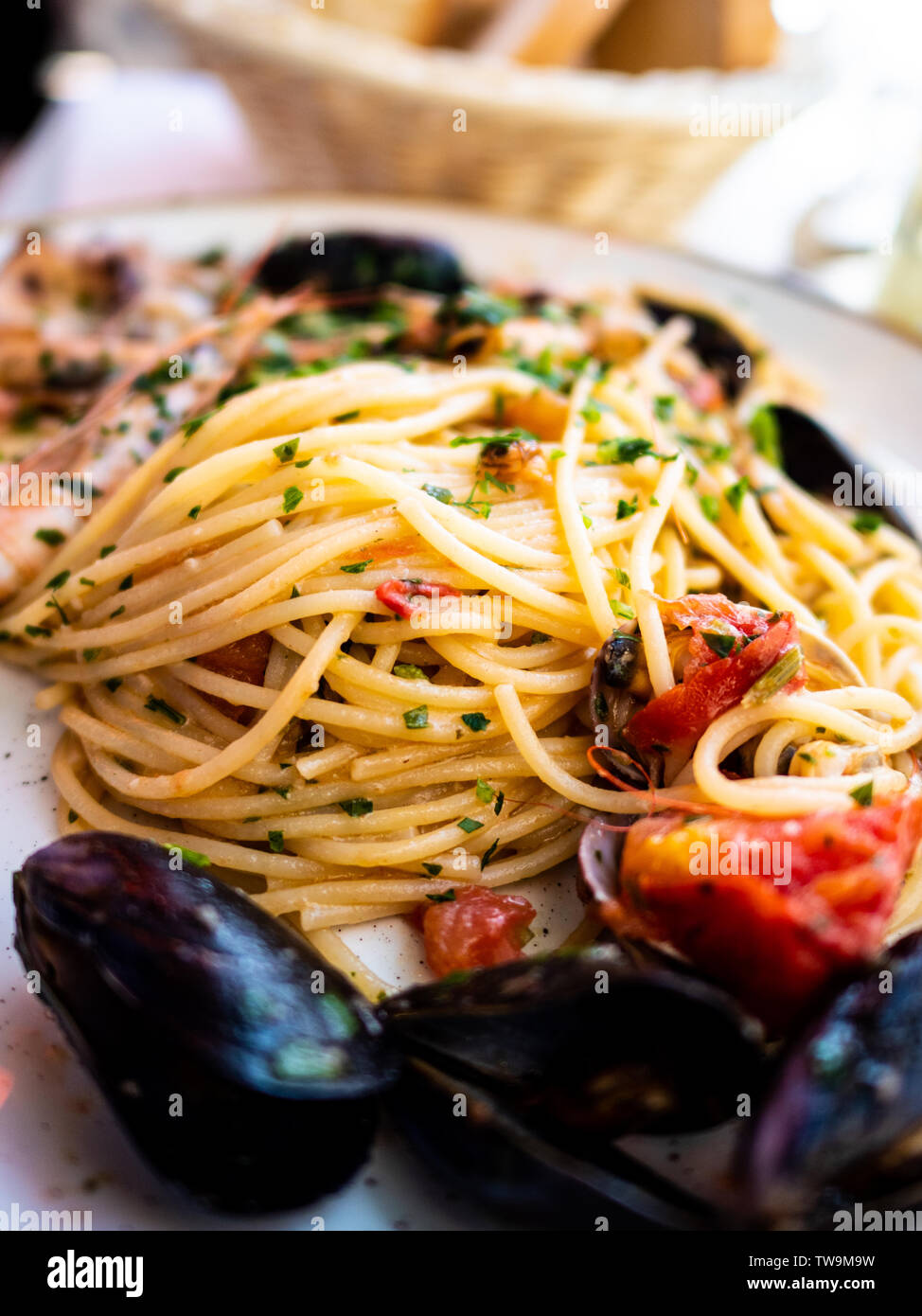 Spaghetti Allo Scoglio Or Spaghetti With Seafood Served In A White Dish With Shrimps And Other Shells Stock Photo Alamy