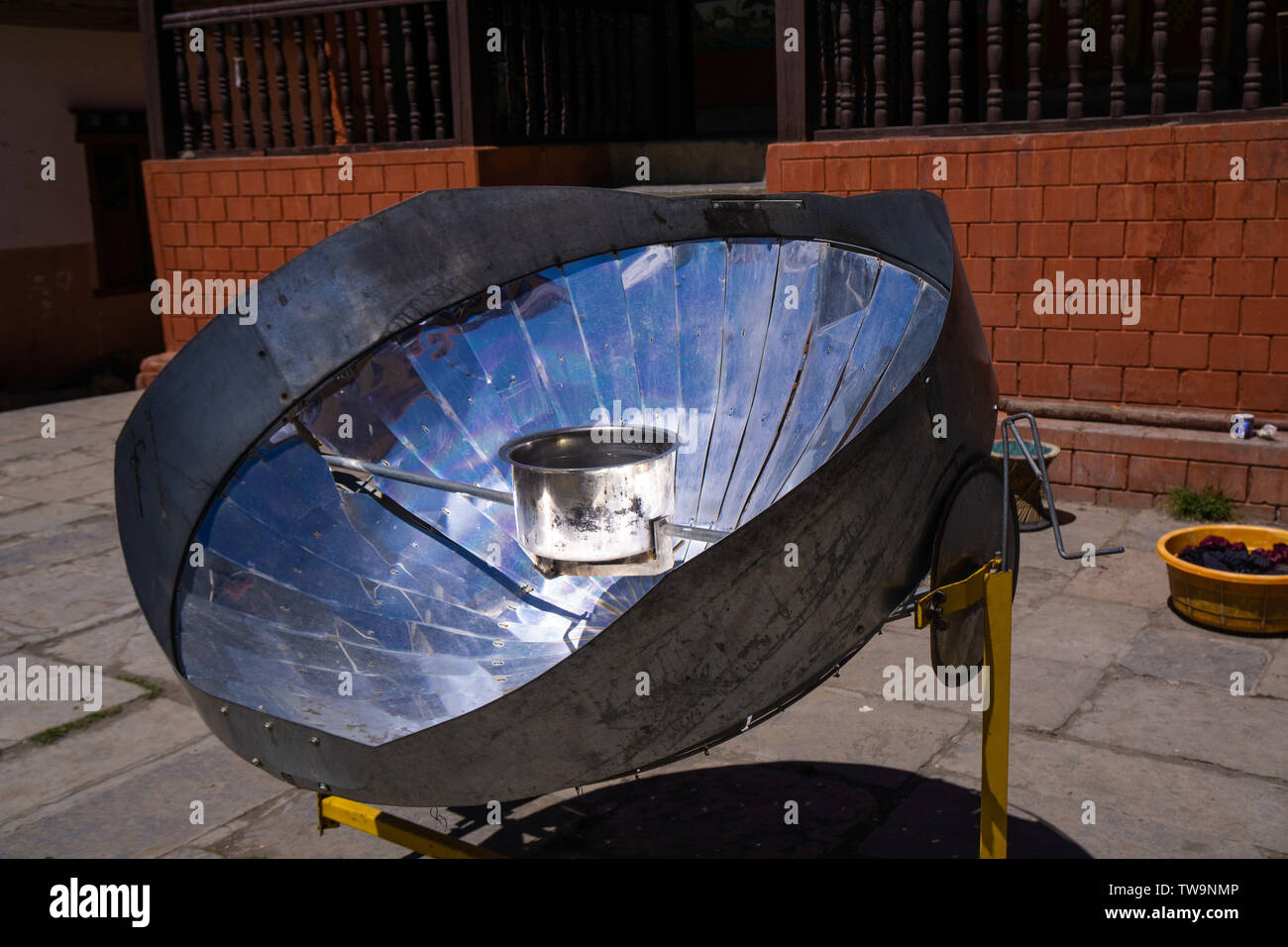 A solar oven heating water, popular in the higher regions of Nepal Stock Photo