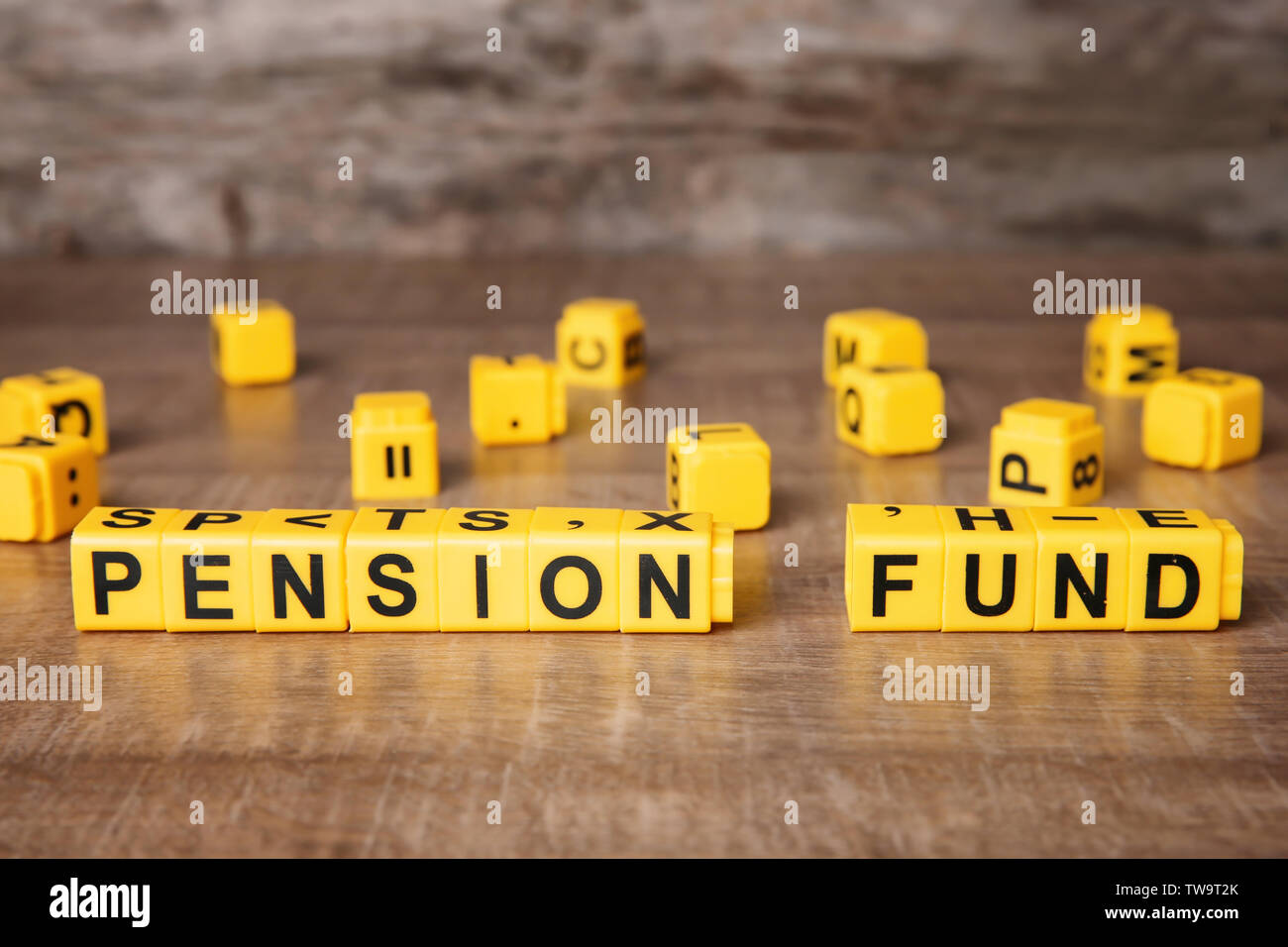 Words 'Pension fund' on wooden table Stock Photo