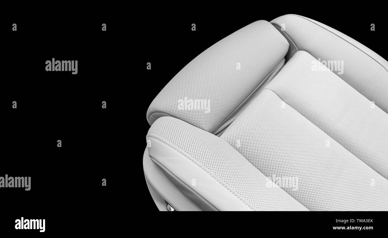 White leather interior of the luxury modern car. Perforated white leather comfortable seats with White leather interior of the luxury modern car. Perforated white leather comfortable seats with