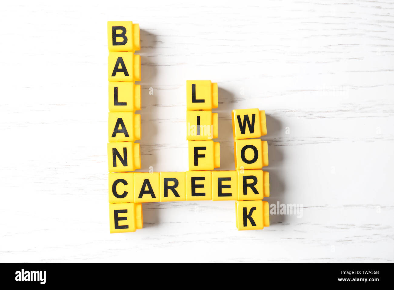 Crossword puzzle with words BALANCE LIFE WORK and CAREER on light