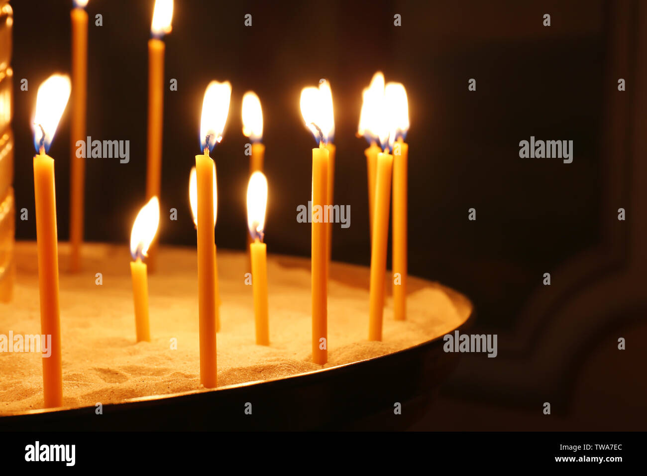 Burning candles in church. Christian religion Stock Photo Alamy
